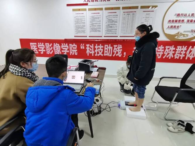 徐州医科大学医学影像学院教师第二党支部与邳州残联携手开展党日活动
